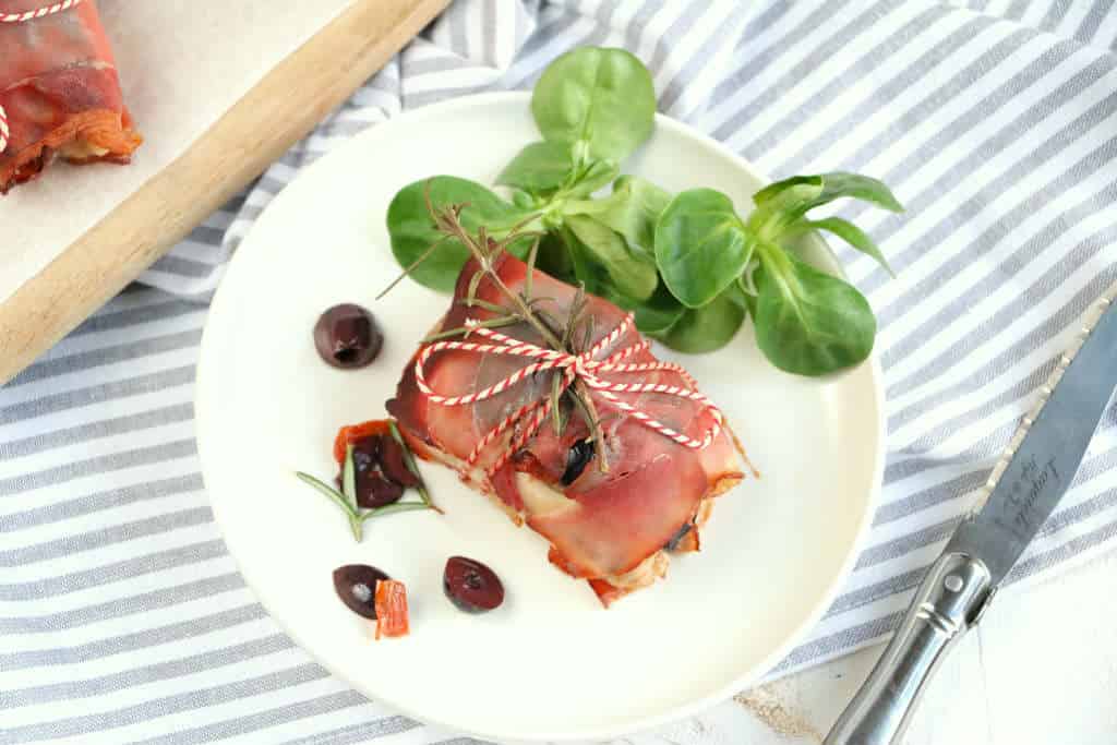 Kippendijen met rauwe ham 