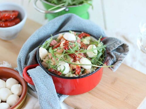 Italiaanse stamppot met rucola, mozzarella, zongedroogde tomaatjes en spekjes